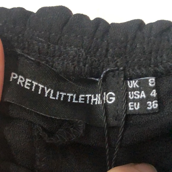 PrettyLittleThing Black Ruffle Edge Bardot Top - Picture 4 of 5